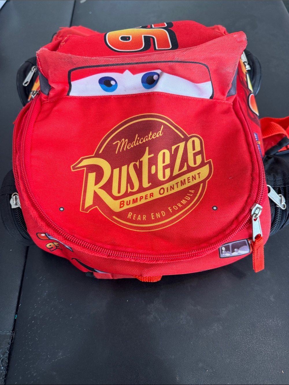 Disney Lightning McQueen Red Kids Backpack with Rust-eze Logo